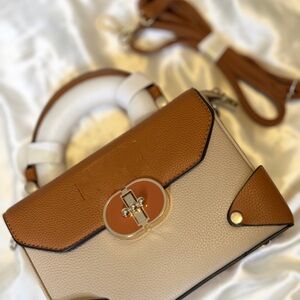 Chic Tan and Cream Crossbody Bag with Turn-Lock Accent